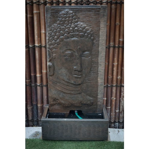 Fontaine mur d'eau visage de Bouddha