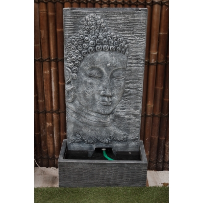 Fontaine mur d'eau visage Bouddha