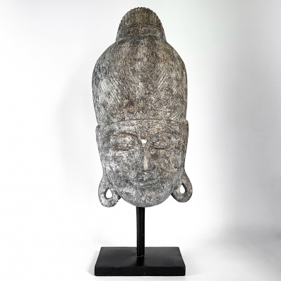 tête de bouddha en bois sur socle