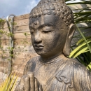 Statue Bouddha debout brun antique